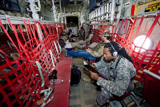 Catching a ride in a <b>C-130</b> is not like travel in a commercial <b>aircraft</b> ...