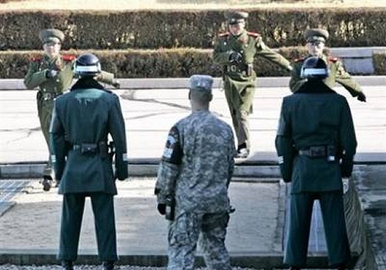 north korean women soldiers. North Korean soldiers march as